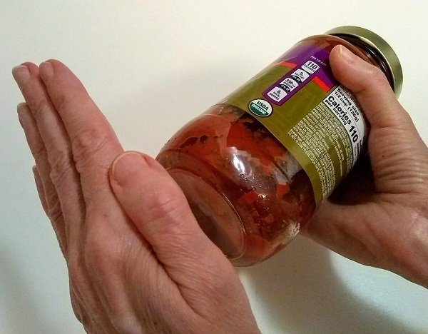 opening a jar with a tight lid