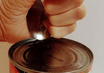 How to open a can without a can opener (by using a spoon)