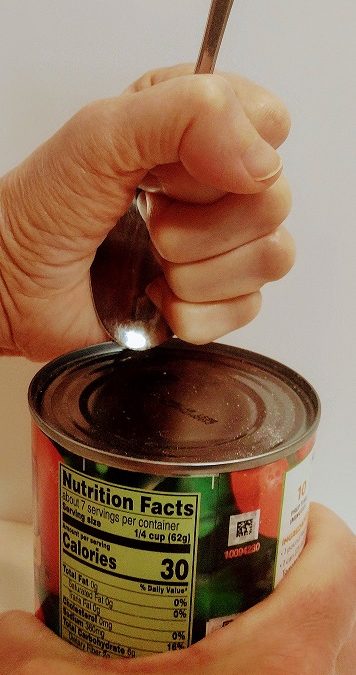 How to open a can without a can opener (by using a spoon)